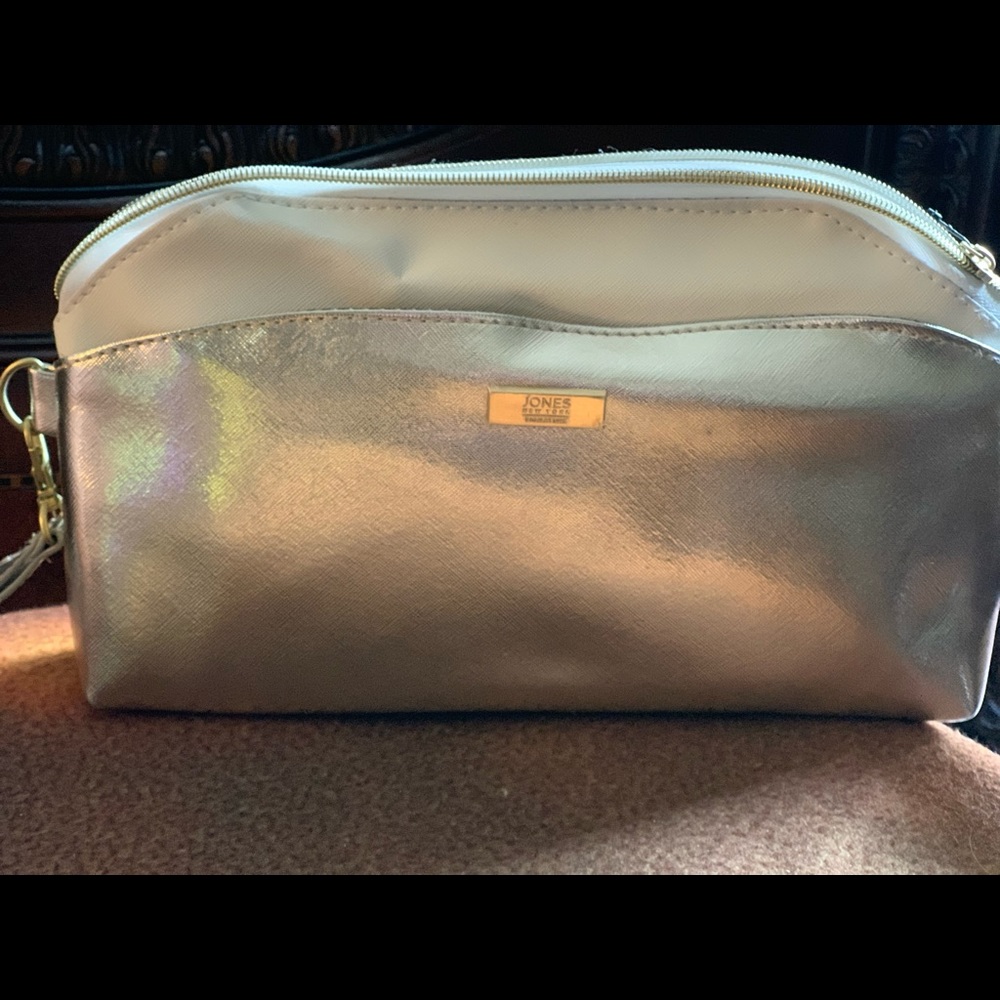 White and gold cosmetic bag